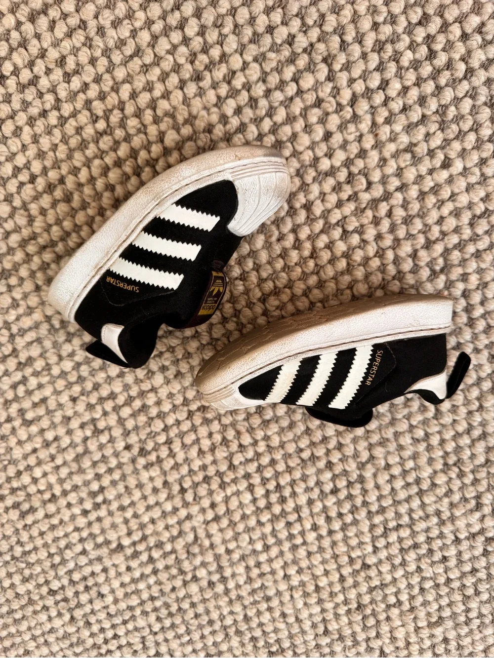 adidas Kids Black & White Slip-On Shell Toe Sneakers with Gold Logo Tab
